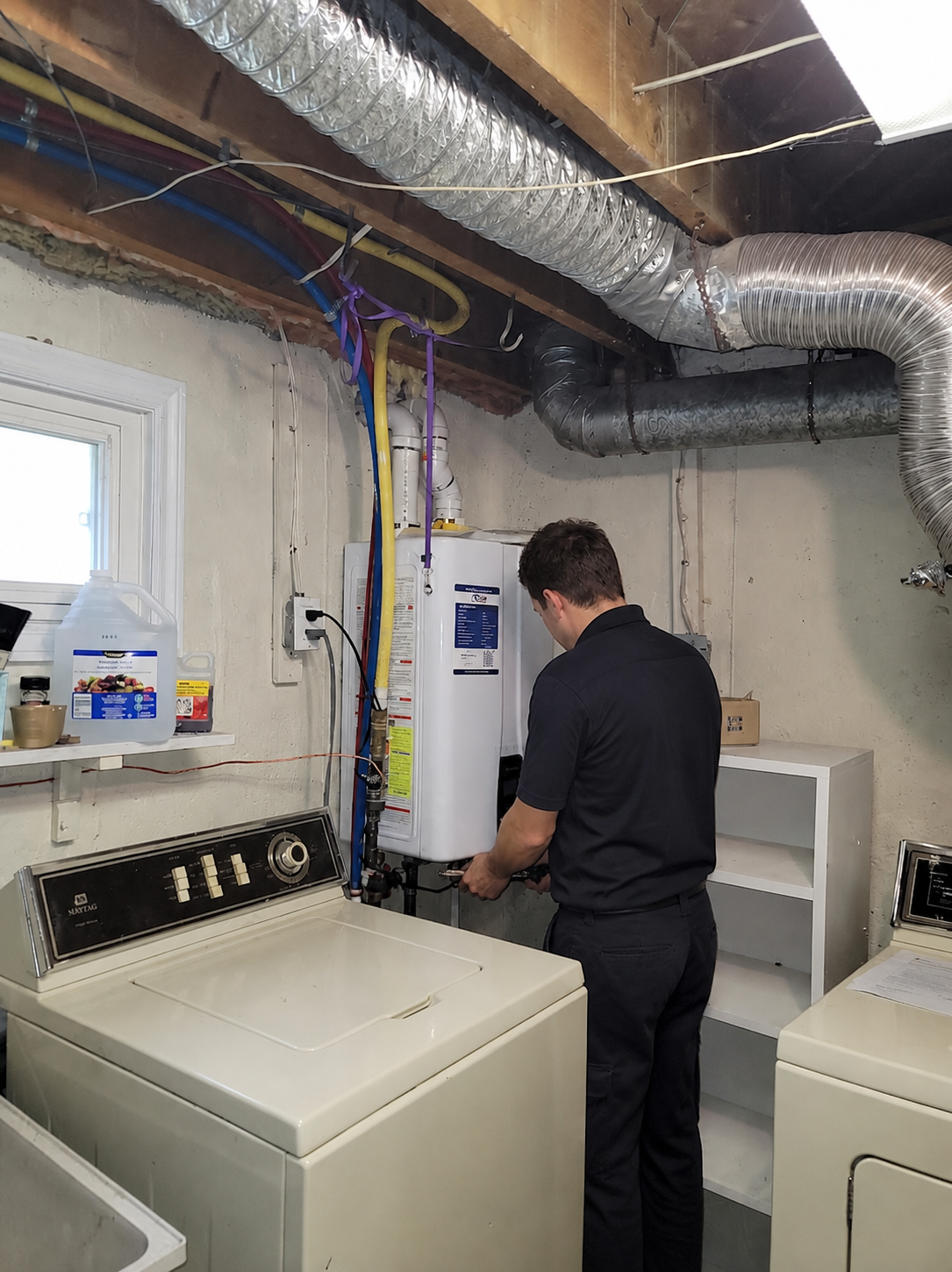 Technician inspecting mechanical equipment